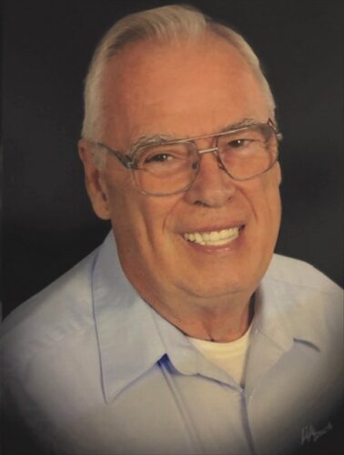 DR. JOHN W. TRAUBERT